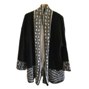 Black with white detail cardigan sweater.